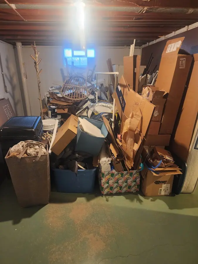 Roll-off dumpster container at job site for 2 Yard Dumpster Rental in Hilo